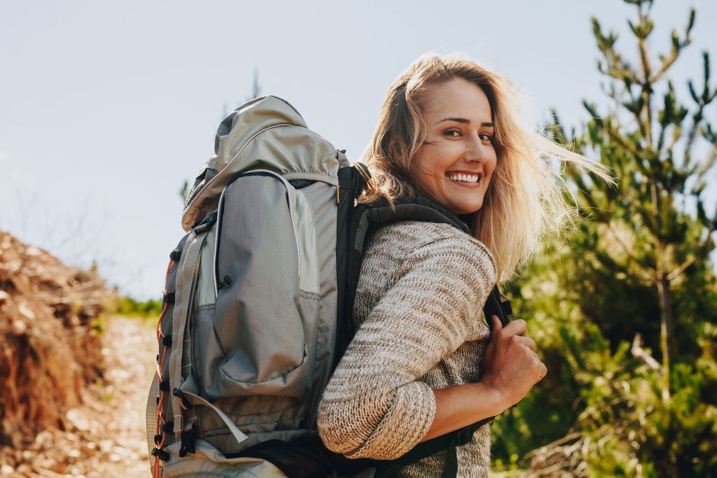Woman hiking with backpack